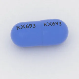 Klindamycyna 300 mg, kapsułka: niebieska i niebieska, 22 mm, z oznaczeniem RX693 po jednej stronie i RX693 po drugiej.