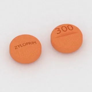 Tablet Alopurinol 300 mg: oranye, bulat, 4 mm, bergaris bagi, dengan kode cetak ZYLOPRIM di satu sisi dan 300 di sisi lainnya.