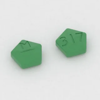 Cimetidine 300 mg tablet: green, five-sided, 10 mm, scored, imprinted M on one side and 317 on the other.