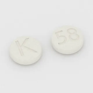 Armodafinil 50 mg tablet: white, round, 6 mm, imprinted K on one side and 58 on the other.