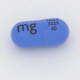 Atomoxetin 40 mg Kapsel: blau, 16 mm, Prägung LILLY 3229 40 mg.
