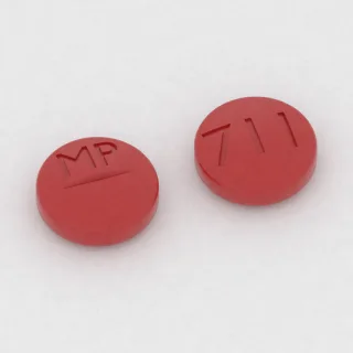 Bisoprolol 5 mg tablet: red, round, 8 mm, scored, imprinted MP on one side and 711 on the other.