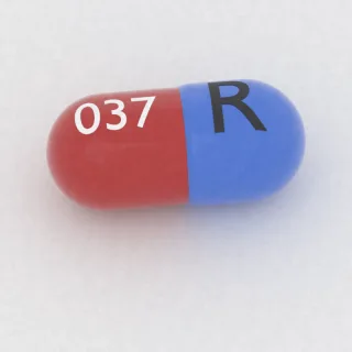 Amantadine 100 mg capsule: blue and red, 18 mm, imprinted R on one side and 037 on the other.