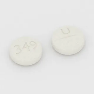 Allopurinol 100 mg tablet: white, round, 8 mm, scored, imprinted 349 on one side and U on the other.