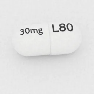 Cewimelina 30 mg, kapsułka: biała, 16 mm, z oznaczeniem L80 po jednej stronie i 30mg po drugiej.
