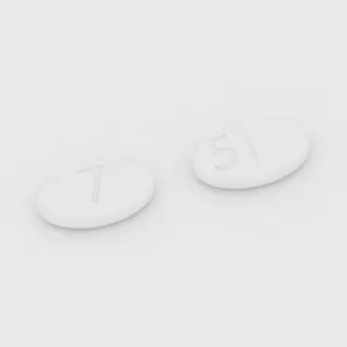 Buspirone 7.5 mg tablet: white, oval, 10 mm, scored, imprinted 7 on one side and 5 on the other.