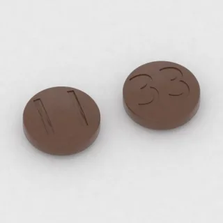 Chlorpromazine 200 mg tablet: brown, round, 12 mm, imprinted 11 on one side and 33 on the other.