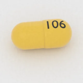 Benzonatat 200 mg Kapsel: gelb, 19 mm, Prägung 106.