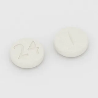 बैक्लोफेन 10 mg टैबलेट: सफ़ेद, गोल, 7 mm, विभाजन रेखा सहित, इम्प्रिंट 24।