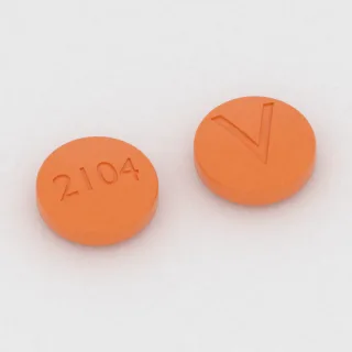 Amitriptilin 75 mg tablet: turuncu, yuvarlak, 10 mm, bir yüzünde 2104, diğer yüzünde V baskısı var.