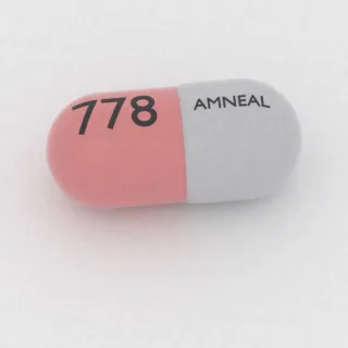 Budesonida, cápsula de 3 mg: gris y roja, 19 mm, con la inscripción AMNEAL en una cara y 778 en la otra.