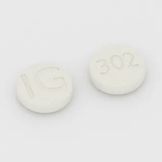 Alfuzosin 10 mg Tablette: weiß, rund, 9 mm, Prägung IG auf der einen Seite und 302 auf der anderen.