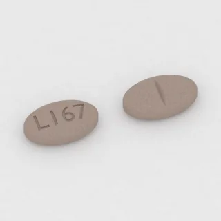 قرص كلونيدين 0.1 mg: بني، بيضاوي، 7 مم، محزّز، النقش L167.