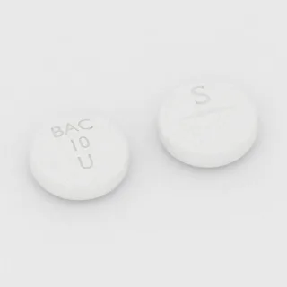 Baclofen 10 mg Tablette: weiß, rund, 8 mm, mit Bruchkerbe, Prägung BAC 10 U S.