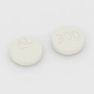 Allopurinol 300 mg tablet: white, round, 12 mm, scored, imprinted AL on one side and 300 on the other.