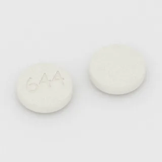 Buprenorfin ve nalokson 8 mg / 2 mg tablet: beyaz, yuvarlak, 10 mm, üzerinde 644 baskısı var.