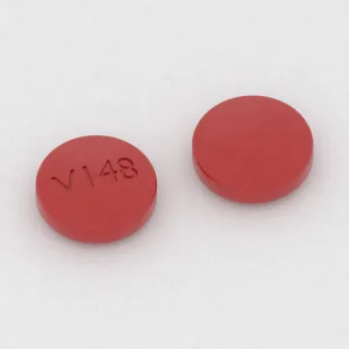 Bupropion 100 mg tablet: kırmızı, yuvarlak, 9 mm, üzerinde V148 baskısı var.