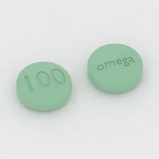 Chlorpromazine 100 mg tablet: green, round, 10 mm, imprinted 100 on one side and omega on the other.