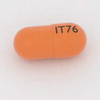 Amantadine 100 mg capsule: orange, 18 mm, imprinted IT76.