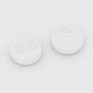 Citalopram 40 mg Tablette: weiß, rund, 9 mm, mit Bruchkerbe, Prägung 208 auf der einen Seite und IG auf der anderen.