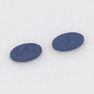 Carbidopa and levodopa 10 mg / 100 mg tablet: blue, oval, 13 mm, scored, imprinted 647.