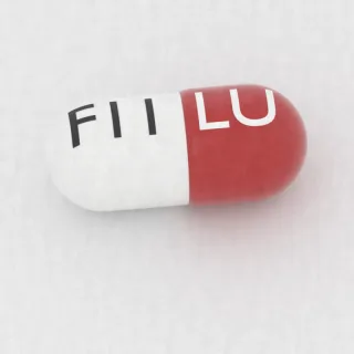 Cefadroksyl 500 mg, kapsułka: czerwona i biała, 22 mm, z oznaczeniem LU po jednej stronie i F11 po drugiej.