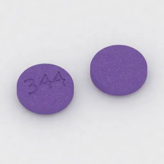 Cetirizin 10 mg Tablette: violett, rund, 10 mm, Prägung 344.