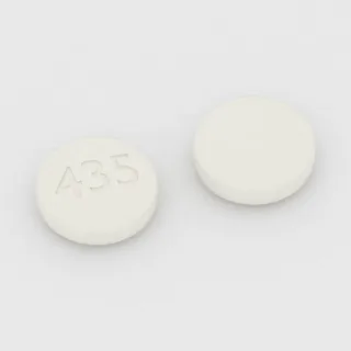 Akamprozat 333 mg, tabletka: biała, okrągła, 10 mm, z oznaczeniem 435.