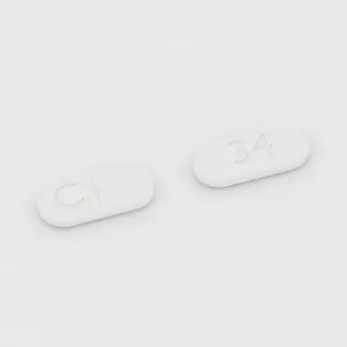 Captopril 50 mg Tablette: weiß, kapselförmig, 11 mm, mit Bruchkerbe, Prägung C auf der einen Seite und 34 auf der anderen.
