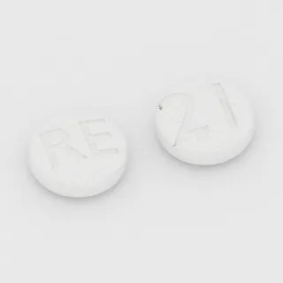 Atenolol 100 mg tablet: white, round, 9 mm, imprinted RE on one side and 21 on the other.