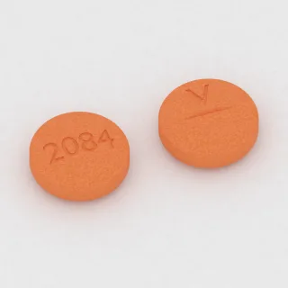 Allopurinol 300 mg tablet: orange, round, 11 mm, scored, imprinted 2084 on one side and V on the other.