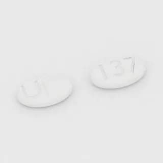 Clonidine 0.3 mg tablet: white, oval, 10 mm, scored, imprinted U on one side and 137 on the other.