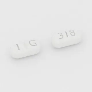 Benztropine 0.5 mg tablet: white, capsule-shaped, 4 mm, scored, imprinted IG on one side and 318 on the other.