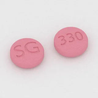 Aripiprazole 10 mg tablet: pink, round, 7 mm, imprinted SG on one side and 330 on the other.