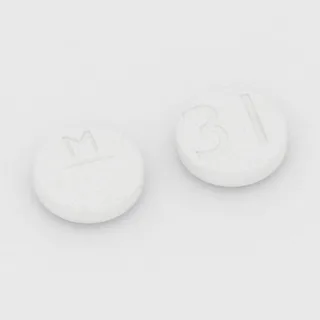 Allopurinol 100 mg tablet: white, round, 10 mm, scored, imprinted M on one side and 31 on the other.