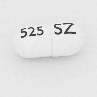 كبسولة أبريبيتانت 40 mg: أبيض وأبيض، 14 مم، النقش SZ على أحد الوجهين و525 على الوجه الآخر.