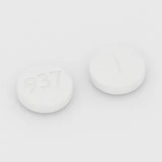 Béthanéchol 50 mg en comprimé : blanc, rond, 11 mm, sécable, inscription 937.