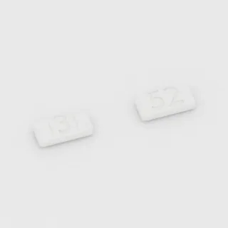 Buspirone 15 mg tablet: white, rectangular, 12 mm, double scored, imprinted 3 on one side and 52 on the other.