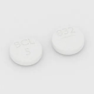 Betanecol 5 mg em comprimido: branco, redondo, 11 mm, sulcado, com a gravação BCL 5 832.