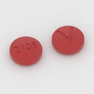 Amitriptilin 100 mg tablet: kırmızı, yuvarlak, 11 mm, bir yüzünde 2105, diğer yüzünde V baskısı var.