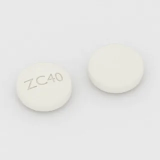 Carvedilol 6.25 mg tablet: white, round, 6 mm, imprinted ZC40.