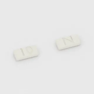 Armodafinil 200 mg tablet: white, rectangular, 12 mm, imprinted 10 on one side and N on the other.