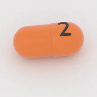 كبسولة بنزوناتات 150 mg: برتقالي، 8 مم، النقش 2.