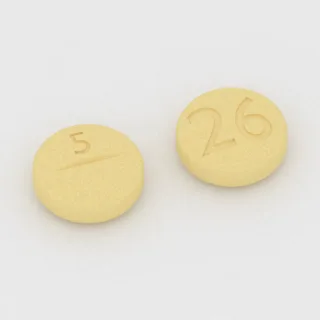 Bumetanid 1 mg Tablette: gelb, rund, 8 mm, mit Bruchkerbe, Prägung 5 auf der einen Seite und 26 auf der anderen.