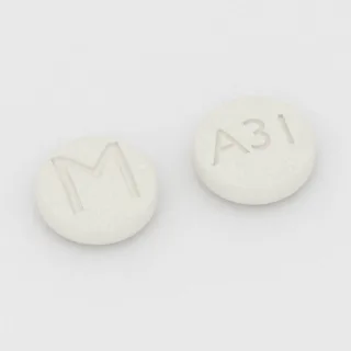 Armodafinil 50 mg tablet: white, round, 6 mm, imprinted M on one side and A31 on the other.
