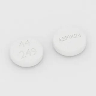 Aspirin 325 mg tablet: white, round, 10 mm, imprinted 44 249 ASPIRIN.