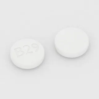 Carbamazepine 200 mg tablet: white, round, 10 mm, imprinted B29.