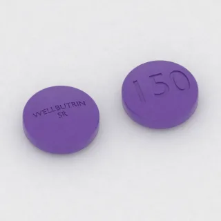 Bupropion 150 mg tablet: mor, yuvarlak, 11 mm, üzerinde WELLBUTRIN SR 150 baskısı var.