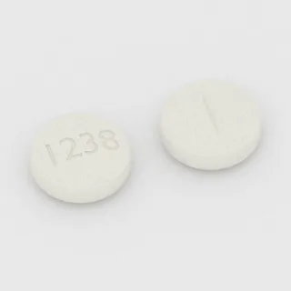 एसिटाज़ोलामाइड 125 mg टैबलेट: सफ़ेद, गोल, 9 mm, विभाजन रेखा सहित, इम्प्रिंट 1238।