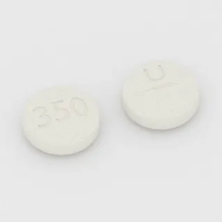 Allopurinol 300 mg tablet: white, round, 11 mm, scored, imprinted 350 on one side and U on the other.